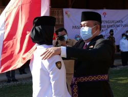 Bupati Tubaba Hi. Umar Ahmad,SP Pimpin Upacara Pengukuhan Pengibar Bendera Pusaka